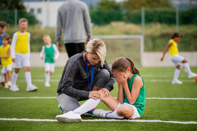 Accident on a football pitch, football training concept.