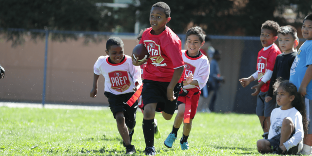 Boys playing flag football