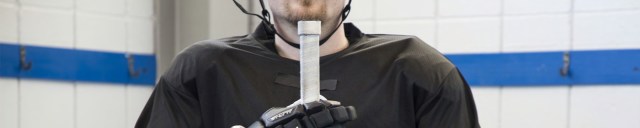 Hockey stick and player