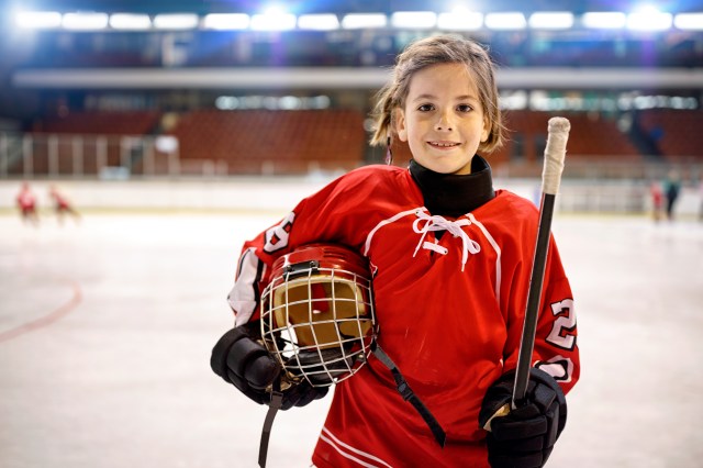 Youth girl hockey players on ice
