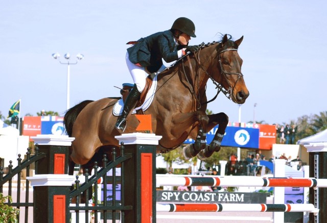 Olympic Gold Medalist Beezie Madden flying over a jump on Prima at the Winter Equestrian Festival February 14, 2010 in Wellington, FL