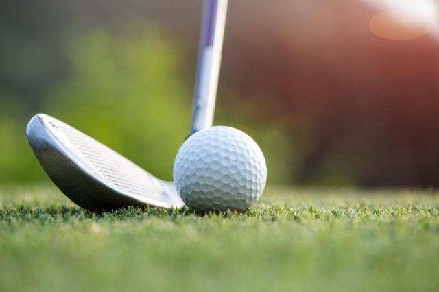 Golf iron and ball